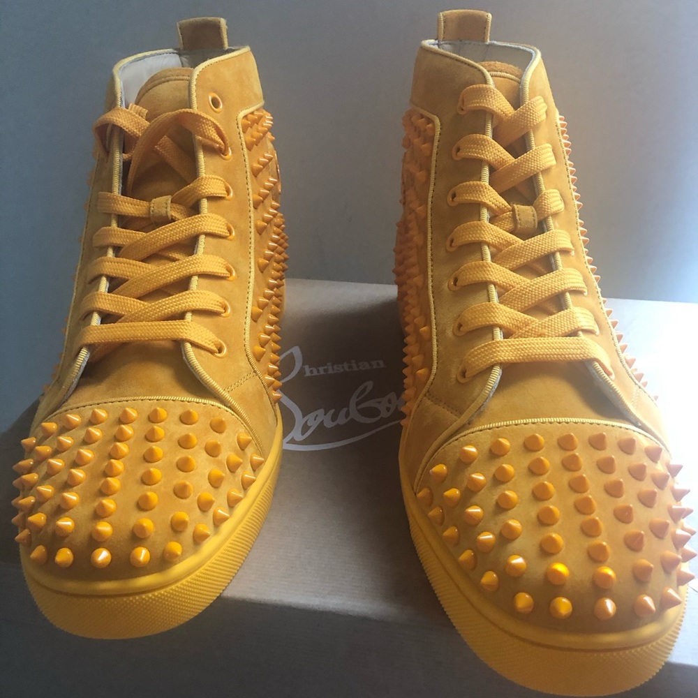 Christian louboutin sued spikes sneakers